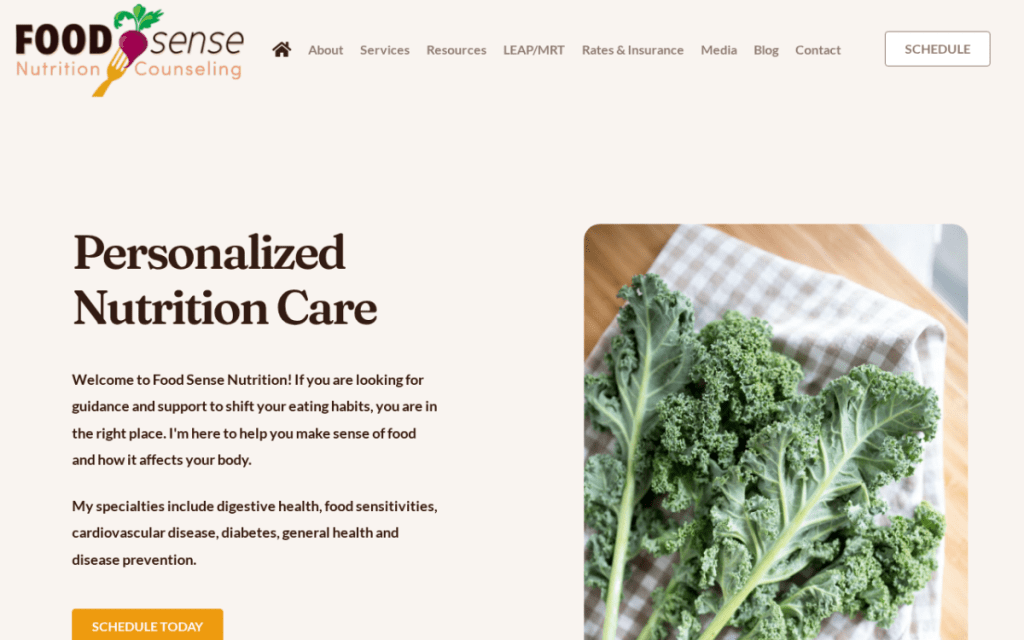 A website homepage for Food Sense Nutrition Counseling, featured in our Web Design Portfolio, showcases a plate of kale and information about personalized nutrition care.