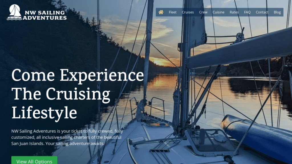 View from the deck of a sailboat on calm water at sunset, with trees and hills in the background and navigation menu at the top—perfect inspiration for a Web Design Portfolio for NW Sailing Adventures.