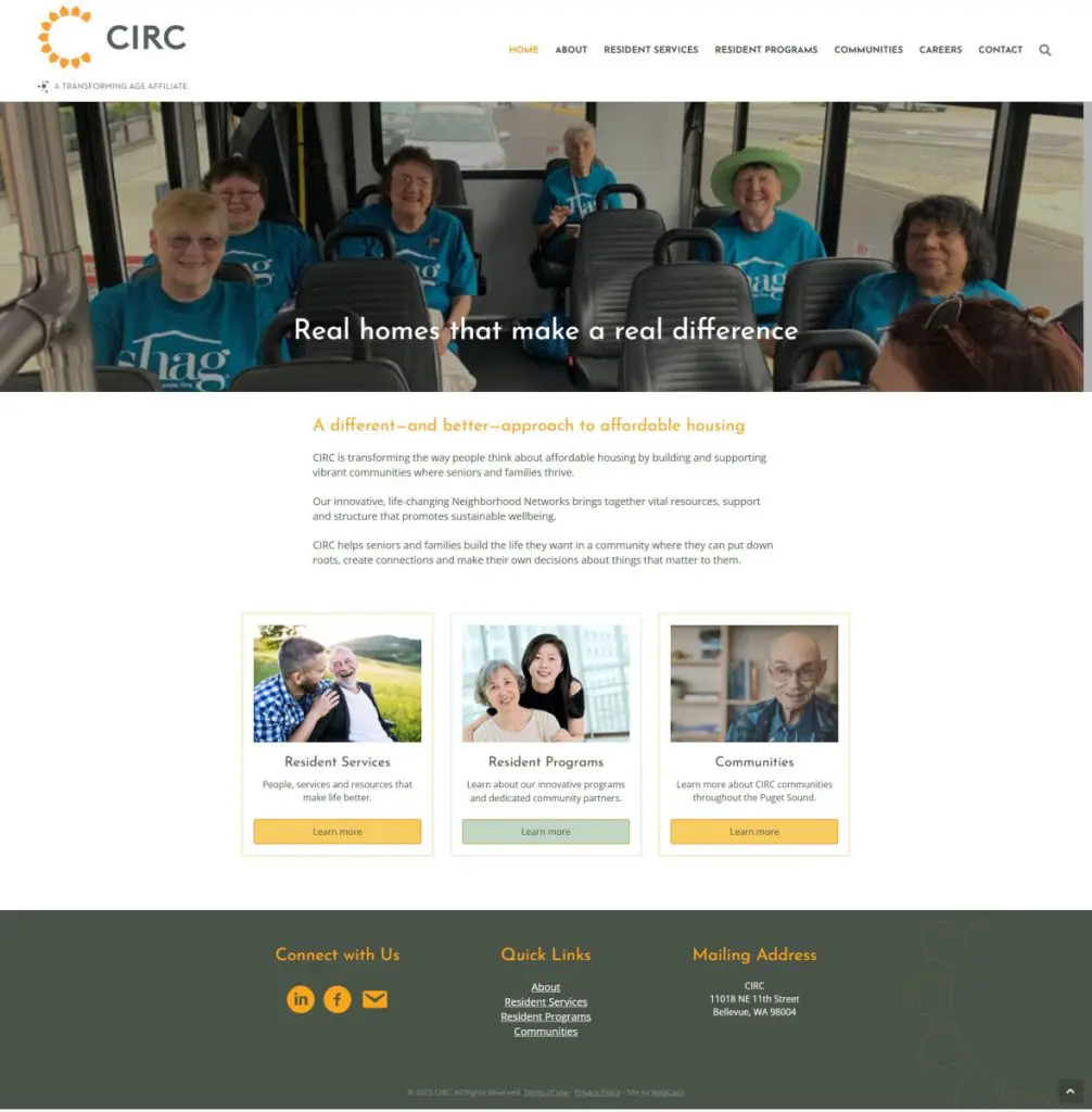 A group of smiling seniors wearing matching shirts sit together on a bus. The website banner, featured in our Web Design Portfolio, highlights affordable housing and supportive services for seniors.