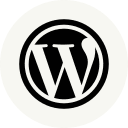 WordPress logo featuring a bold, stylized “W” centered in a black circle with a white background—perfect for showcasing your Web Design Portfolio.