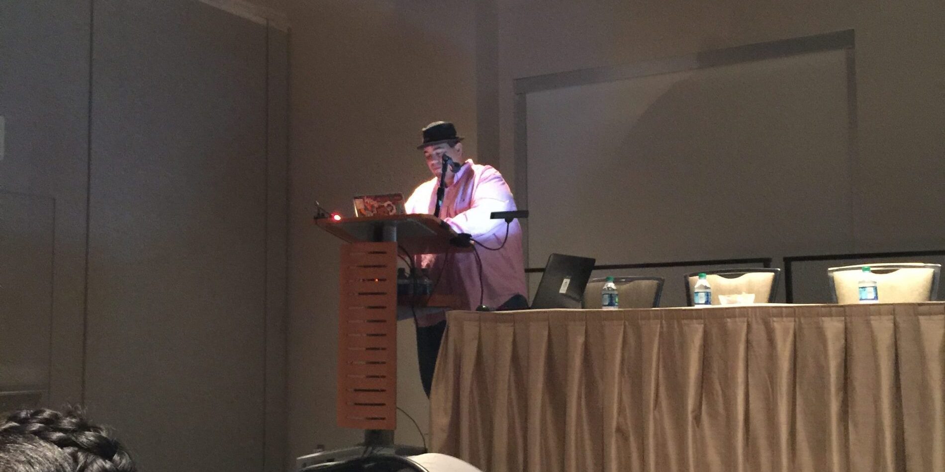 A man giving a speech at WordCamp Seattle 2016.