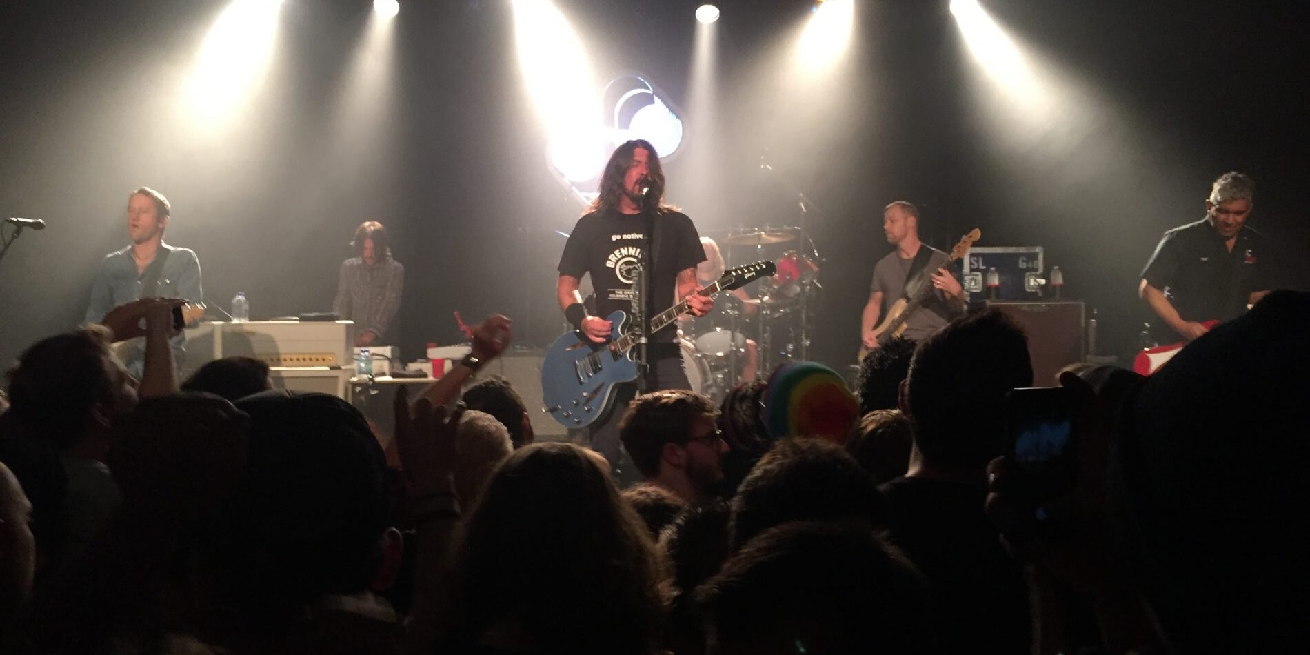 The Foo Fighters performing live on stage at a concert from their Sonic Highways tour.