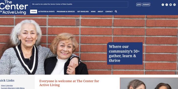 Two smiling women stand in front of a brick wall, with a banner for The Center for Active Living subtly showcasing its sleek web design in the background.