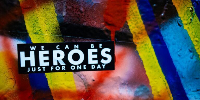 A sticker that says we can heros just for one day