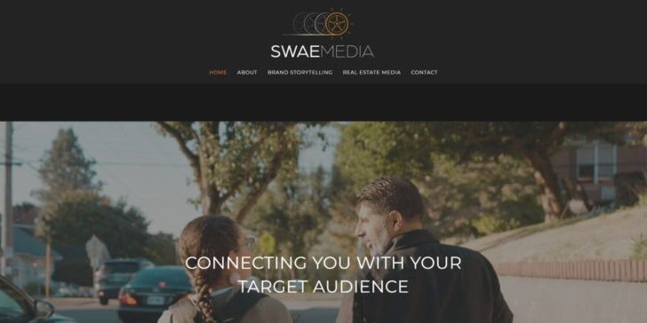 A website homepage featuring the logo "SWAE MEDIA," a navigation menu, and a background image of two people walking outside. The text reads, "Connecting you with your target audience through expert videographer insights and cutting-edge website design.